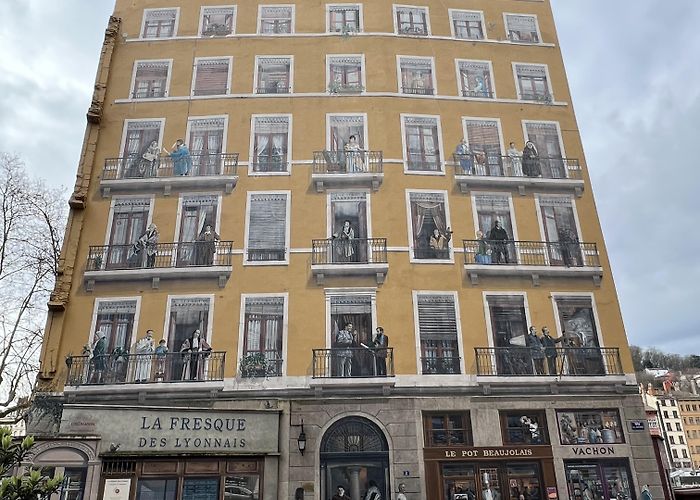 Fresque des Lyonnais This wall is entirely painted to look like the front of a building ... photo