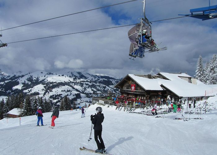 Ski Lift Schonried Horneggli Gstaad Switzerland skiing | TheLuxuryVacationGuide photo