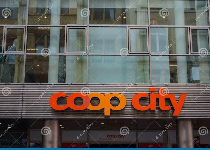 Coop headquarters Basel, Switzerland - July 4 2022: Coop Sign on a Store Building ... photo