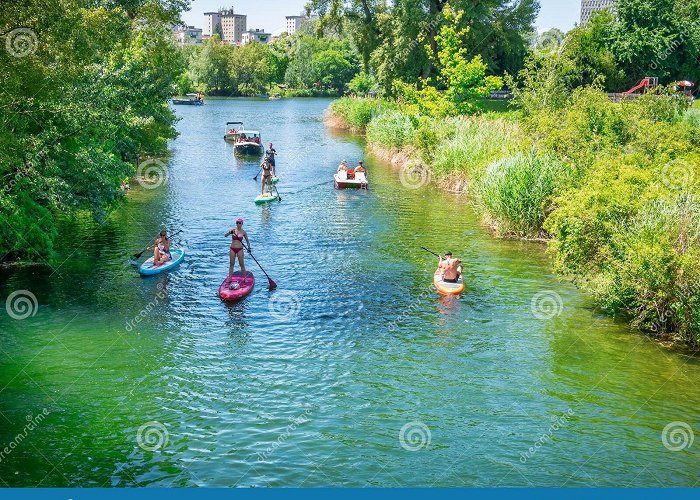 Kaiserwasser Lake Summer Landscape at the Beach with People Paddling in Kayaks and ... photo