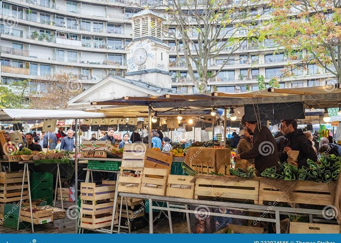 Place d'Aligre Paris, France - February 11th 2019: Busy Athmosphere during Monday ... photo