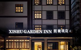 Xishu Garden Inn - Travel Agency Service - Car Rent Service - English Speaking Chengdu Exterior photo