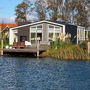 Villa Modern Chalet With Jetty And Terrace à Wemeldinge Exterior photo
