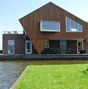 Appartement Beautiful Penthouse With A View Over The Lake à Uitgeest Exterior photo